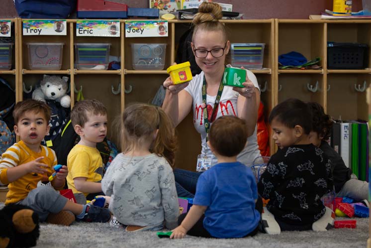 daycare teacher with children