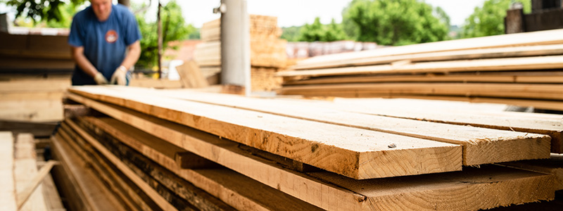 Stack of lumber outside hardware store